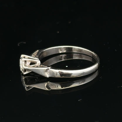 9ct white gold diamond ring with sparkling diamonds, elegant jewelry piece featuring a sleek design and fine craftsmanship.