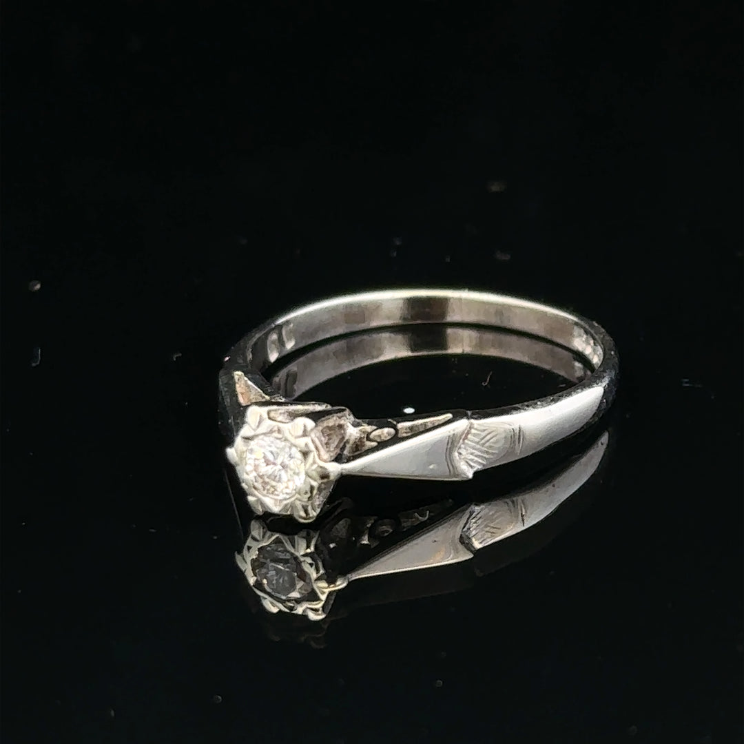 9ct white gold diamond ring with sparkling diamonds, elegant jewelry piece showcasing fine craftsmanship and timeless design.