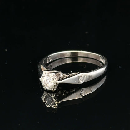 9ct white gold diamond ring with sparkling diamonds, elegant jewelry piece showcasing fine craftsmanship and timeless design.