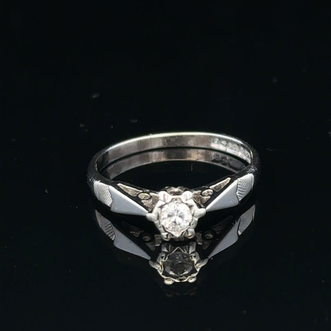9ct white gold diamond ring with sparkling diamonds, showcasing an elegant and timeless design.