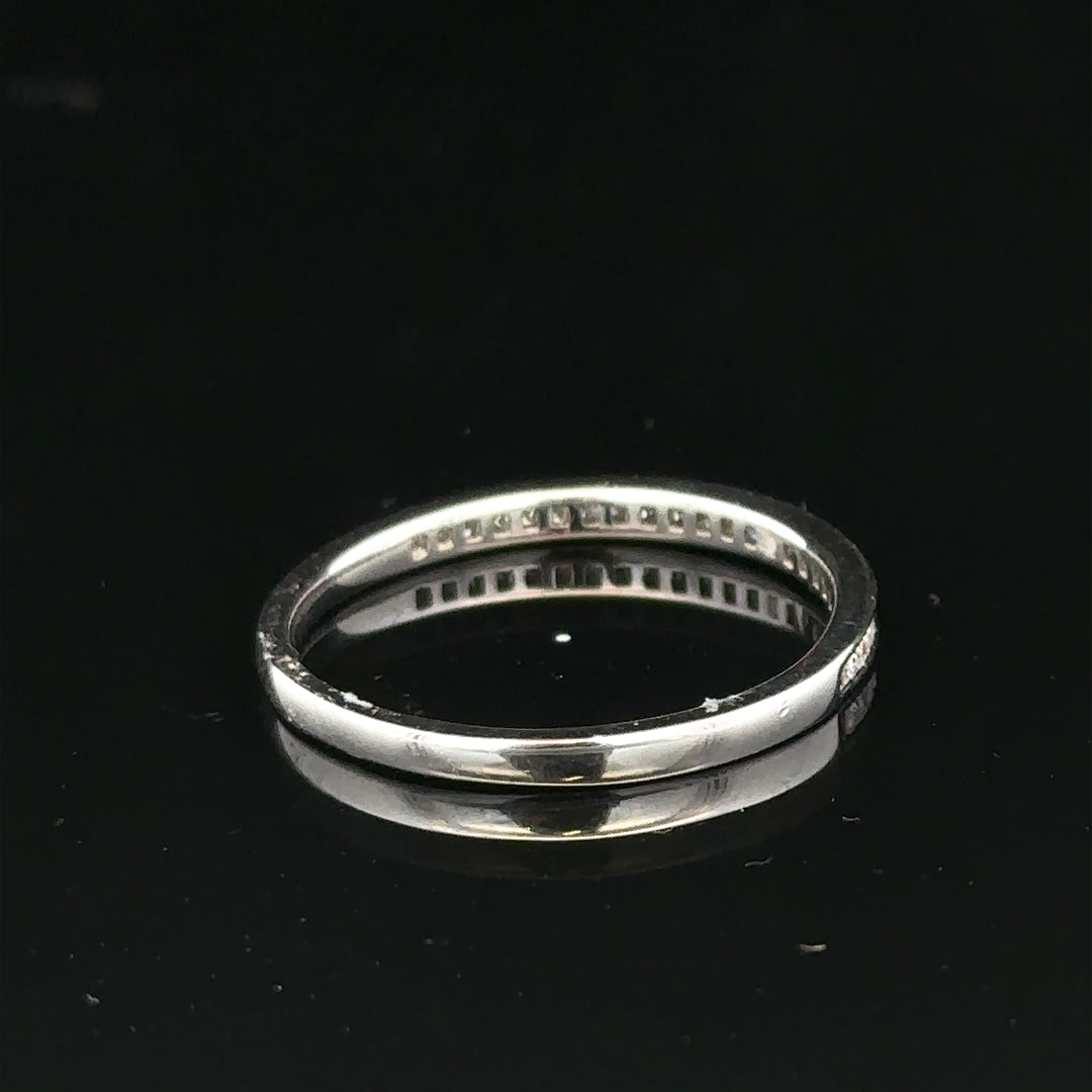 18ct white gold diamond ring in size Q1/2, featuring sparkling diamonds and a sleek band design.