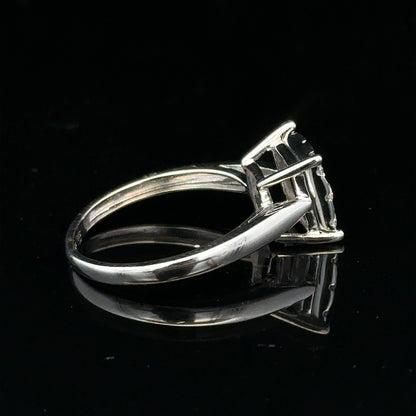 9ct white gold half carat diamond ring with a central sparkling diamond and elegant band design.