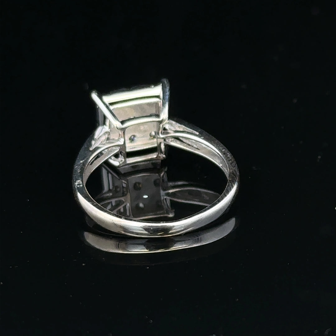 9ct white gold half carat diamond ring with a central diamond and elegant band, unbranded jewelry accessory.