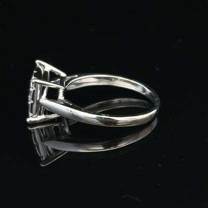 9ct white gold diamond ring with half-carat solitaire diamond, featuring a sleek band and sparkling gemstone.