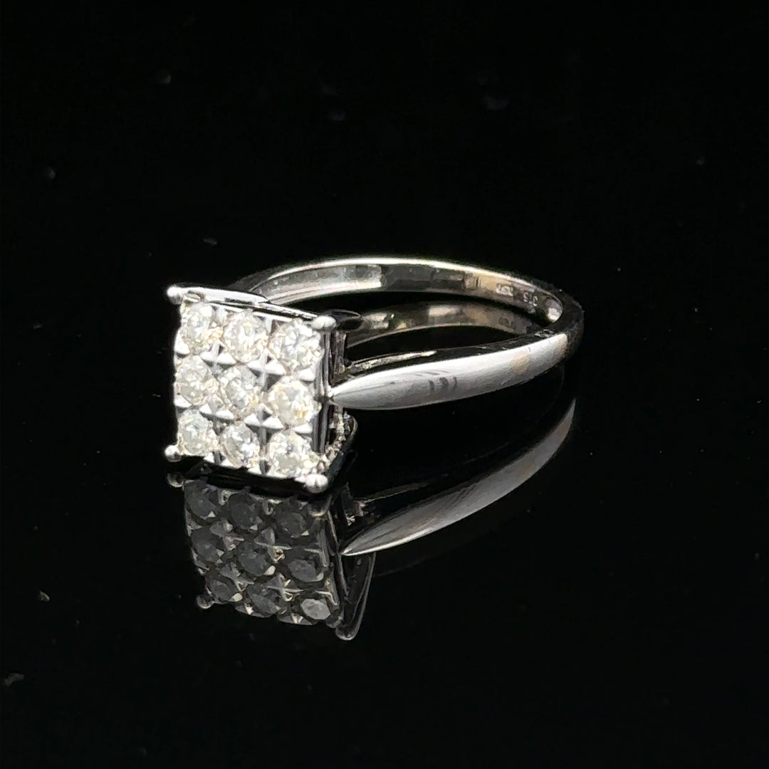 9ct white gold diamond ring with half-carat round cut diamond, showcasing elegant design and sparkling gemstone.
