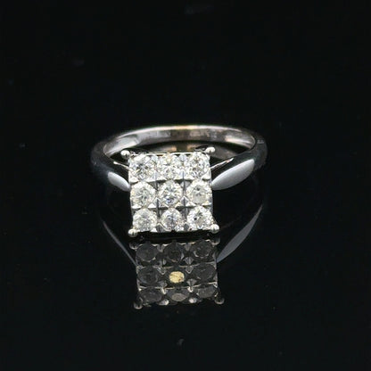 9ct white gold diamond ring with half-carat solitaire diamond, featuring a sleek band and sparkling central stone.