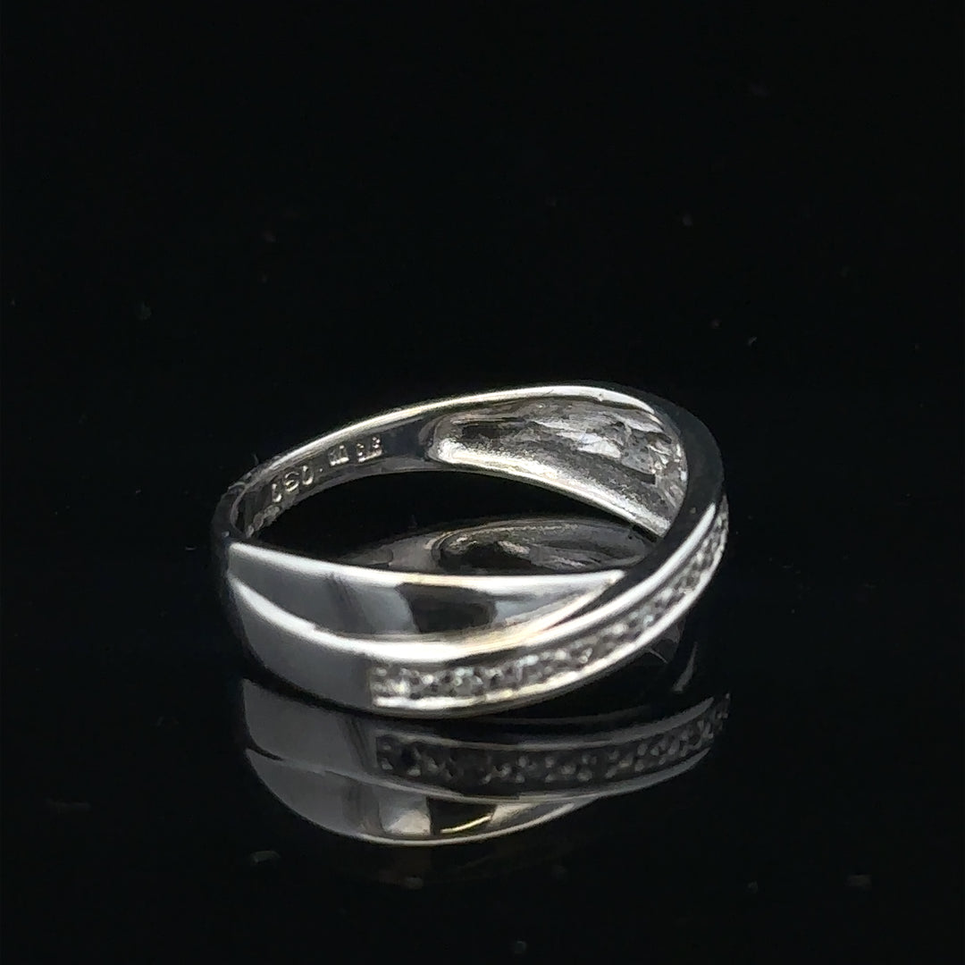 9ct white gold diamond ring size J1/2, showcasing sparkling diamonds on a sleek band, unbranded jewelry piece.