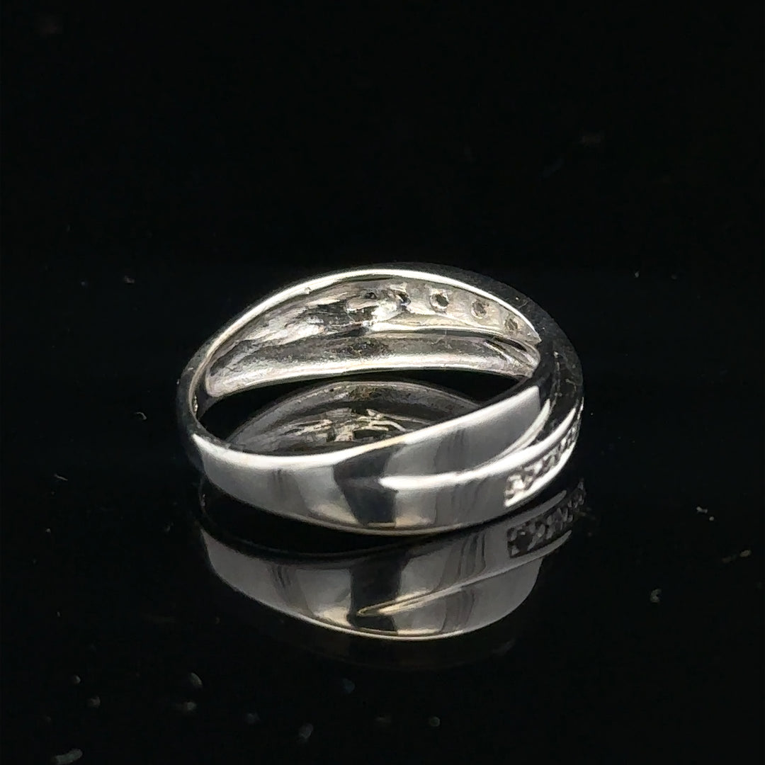 9ct white gold diamond ring in size J1/2 with sparkling diamonds, elegant jewelry piece, unbranded design.