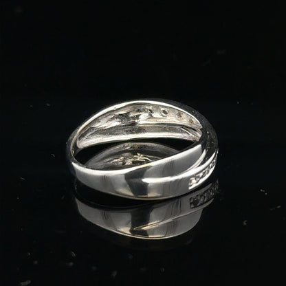9ct white gold diamond ring in size J1/2 with sparkling diamonds, elegant jewelry piece, unbranded design.