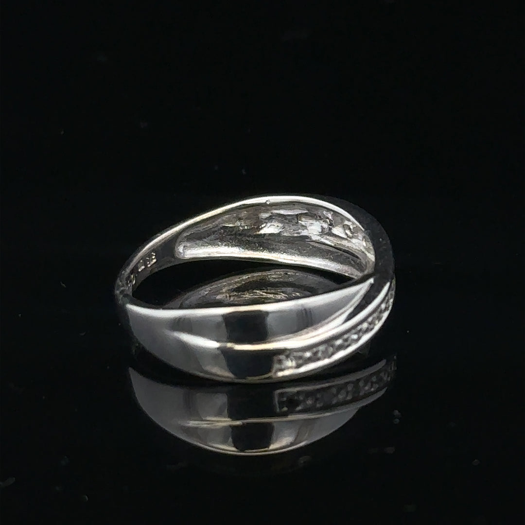 9ct white gold diamond ring size J1/2 with sparkling diamonds, elegant jewelry piece on a plain background
