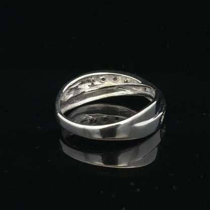 9ct white gold diamond ring in size J1/2 with sparkling diamonds, showcasing elegant jewelry design.
