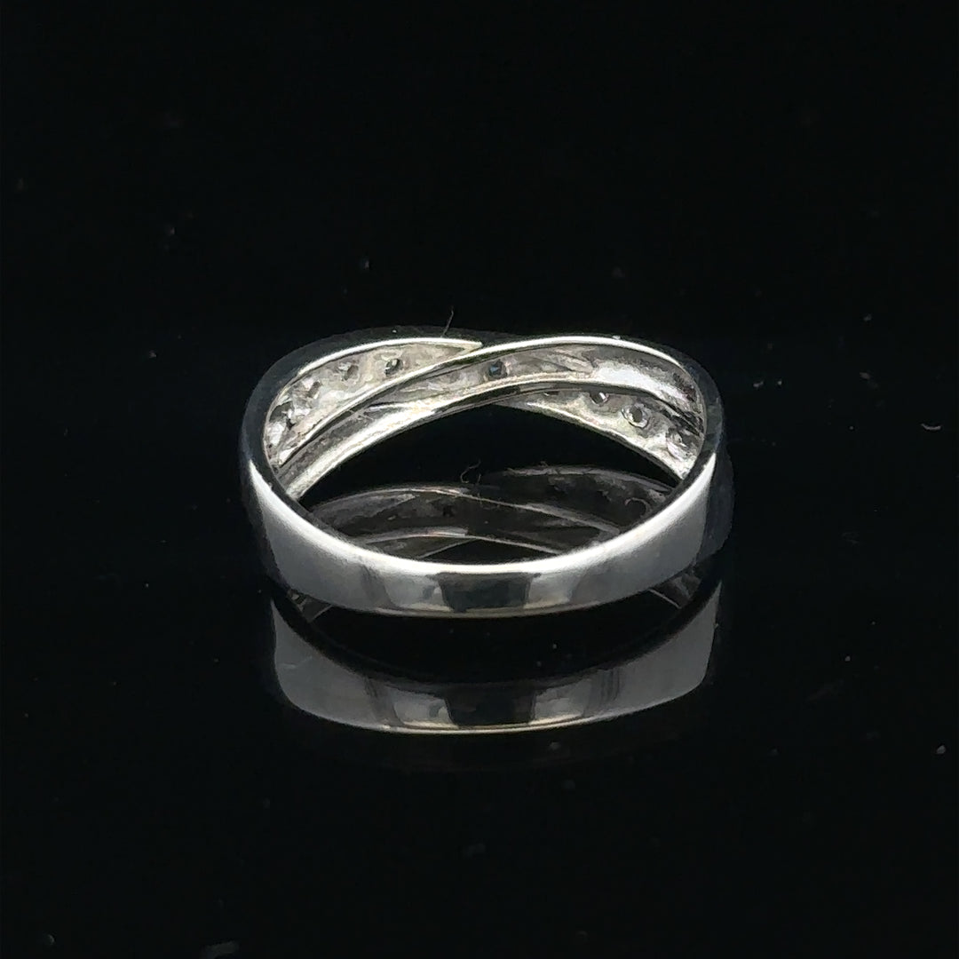 9ct white gold diamond ring size J1/2 featuring a sparkling diamond set in a sleek band.