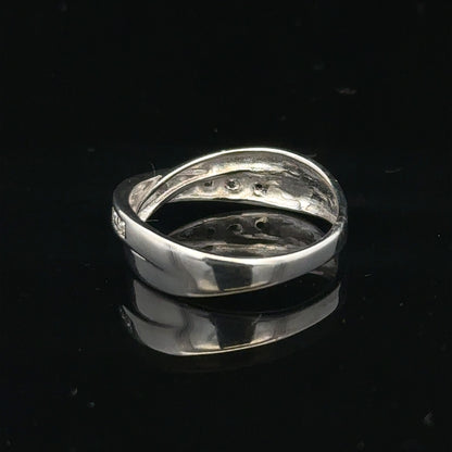 9ct white gold diamond ring in size J1/2, featuring sparkling diamonds and a polished band.