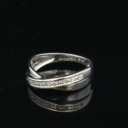 9ct white gold diamond ring in size J1/2 with sparkling diamonds, showcasing a elegant jewelry design.