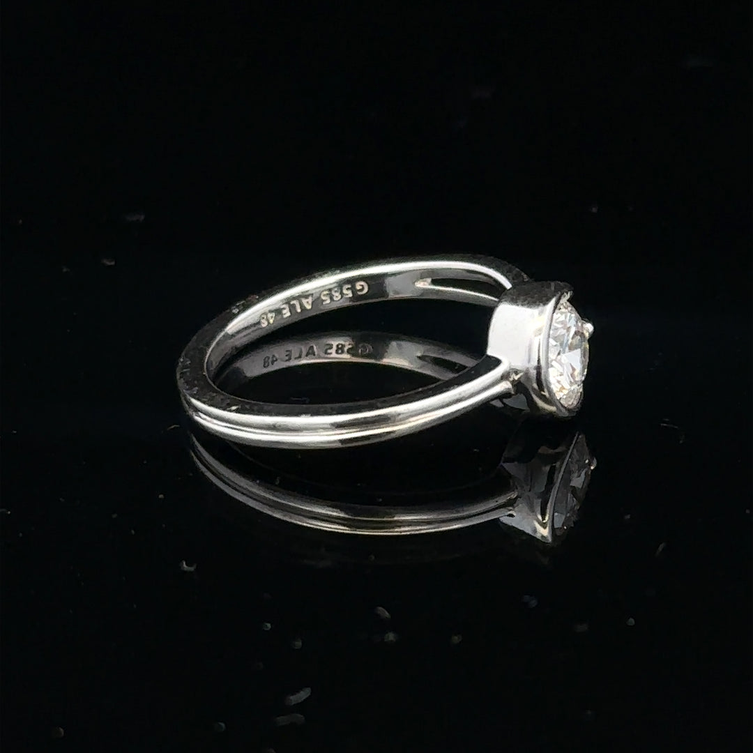14ct white gold lab-grown diamond ring in size I, featuring a sparkling central diamond and elegant band design.