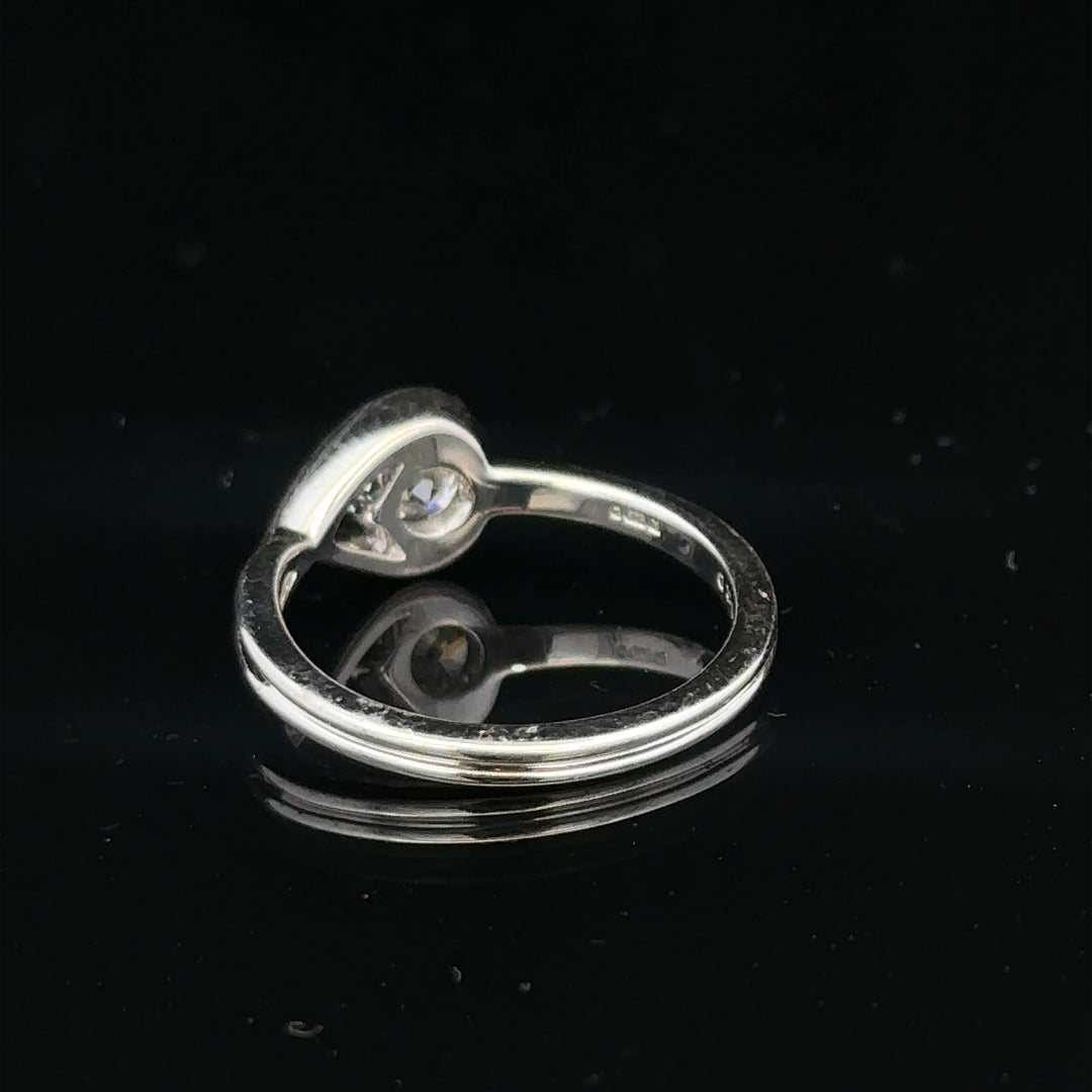 14ct white gold lab-grown diamond ring in size I, featuring a sparkling central diamond and a sleek, elegant band.