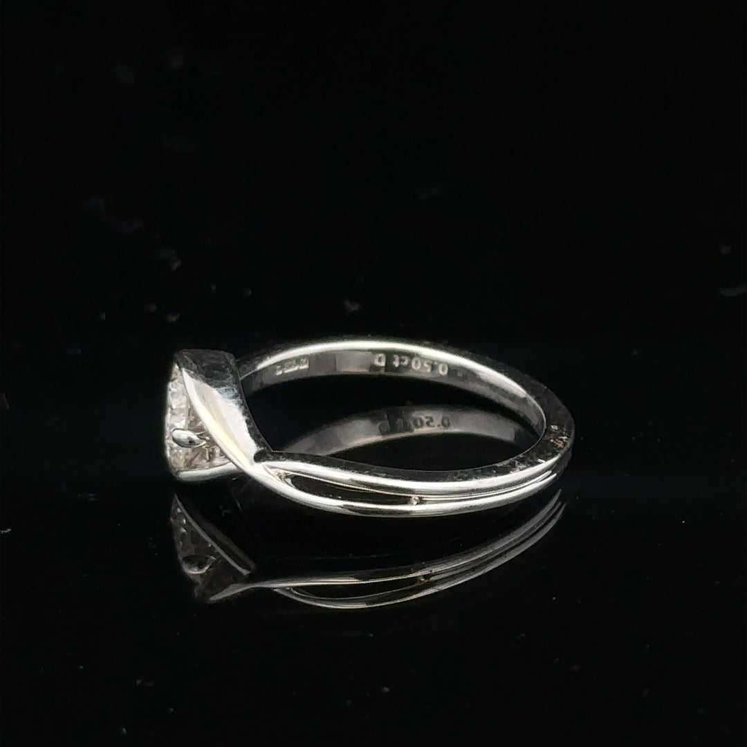 14ct white gold lab-grown diamond ring in size I, featuring a sparkling diamond centerpiece and elegant band design.