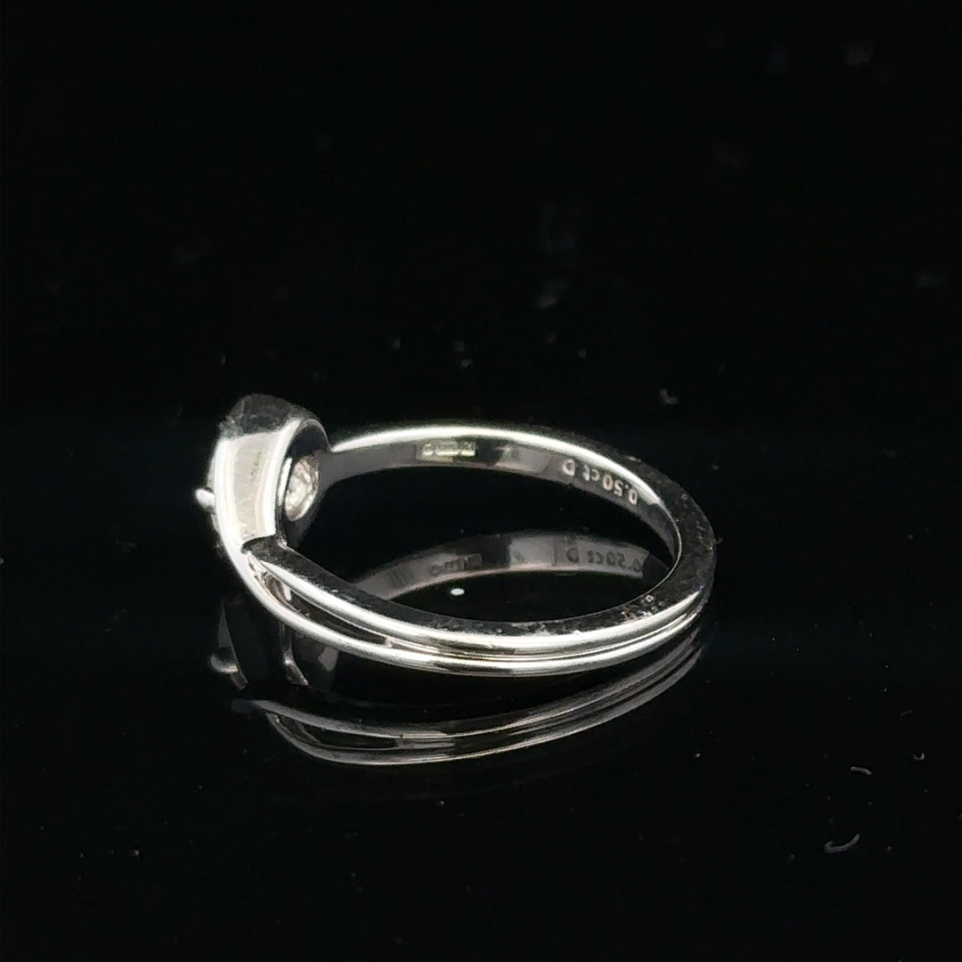 14ct white gold lab-grown diamond ring size I with sparkling diamonds and sleek band design.