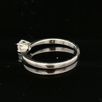 18ct white gold diamond ring with 1/4 carat round diamond, size P1/2, featuring a sleek band and sparkling gemstone.