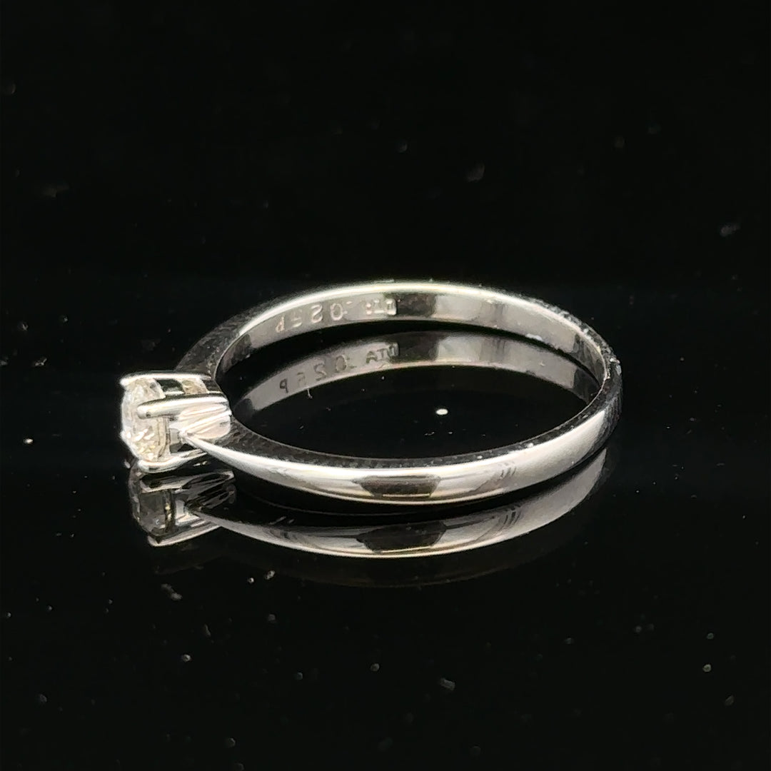 18ct white gold diamond ring with 1/4 carat center stone, size P1/2, showcasing a sparkling, elegant jewelry piece