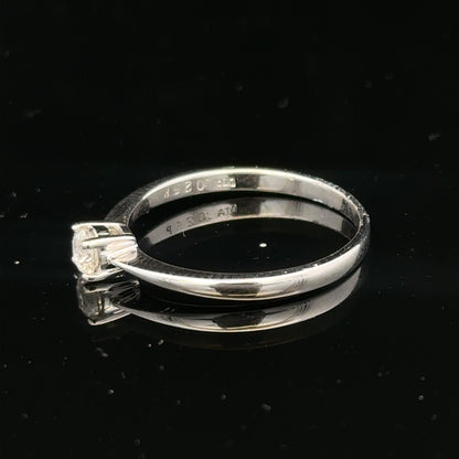 18ct white gold diamond ring with 1/4 carat center stone, size P1/2, showcasing a sparkling, elegant jewelry piece
