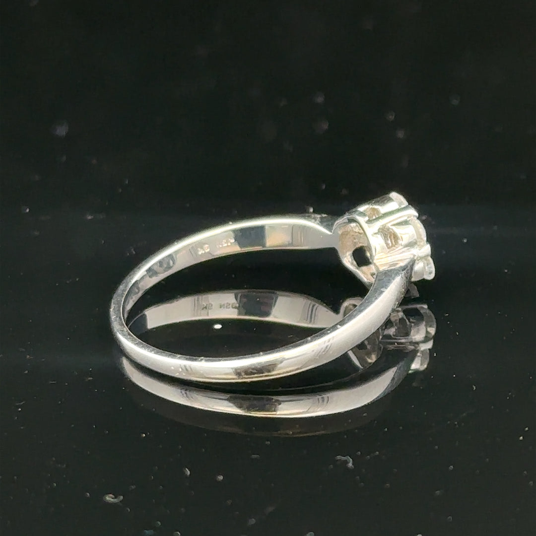 9ct white gold diamond cluster ring in size O 1/2 with multiple diamonds arranged in a sparkling cluster design.