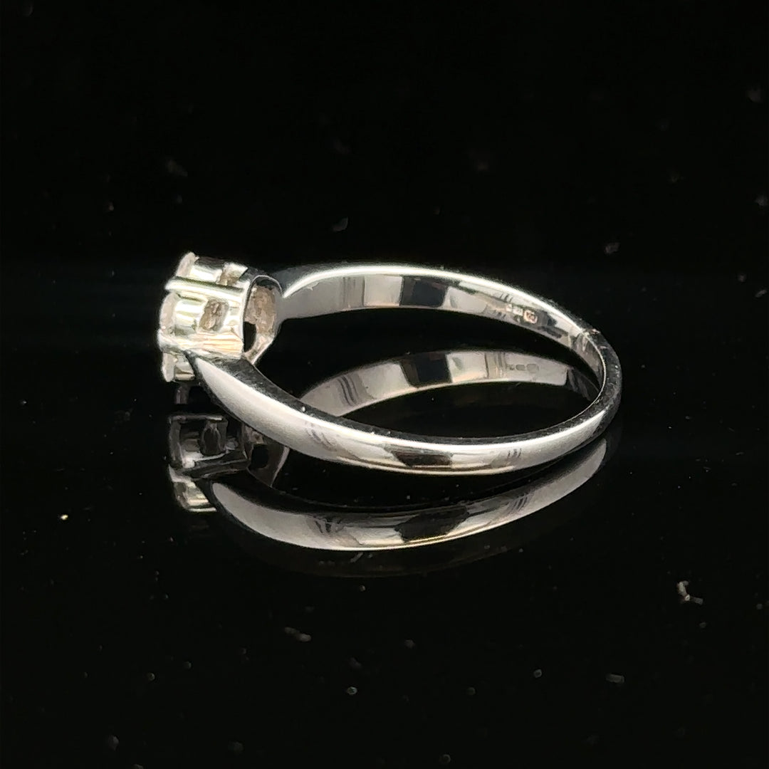 9ct white gold diamond cluster ring size O 1/2 featuring a sparkling diamond cluster setting on a sleek band.