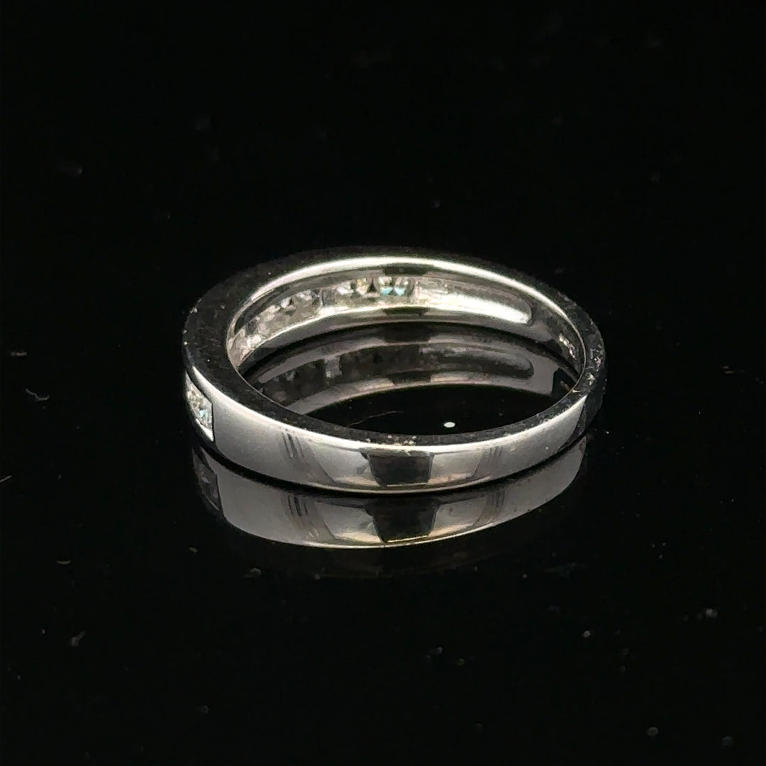 18ct white gold diamond ring with a size L, featuring sparkling diamonds set in a sleek design.