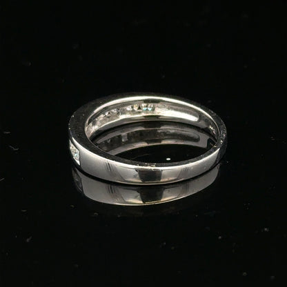 18ct white gold diamond ring with a size L, featuring sparkling diamonds set in a sleek design.