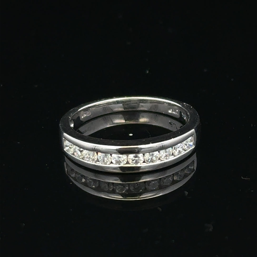 18ct white gold diamond ring in size L with sparkling diamonds, crafted by Un.