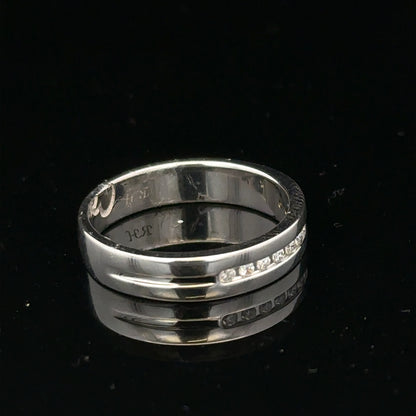9ct white gold diamond ring with 0.20 carats, size M, featuring a sparkling gemstone and elegant design.