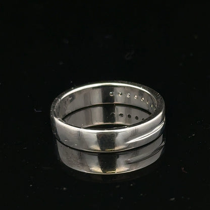 9ct white gold diamond ring with 0.20 carats, size M, featuring a sparkling central diamond and elegant design.