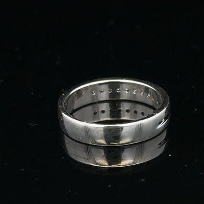 9ct white gold diamond ring with 0.20 carats, size M, featuring a sparkling central stone and elegant design.