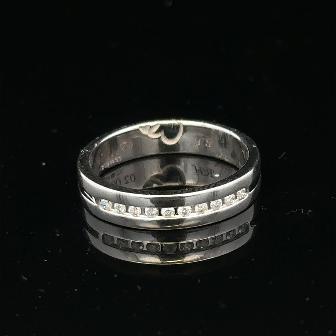 9ct white gold diamond ring with 0.20 carats, size M, featuring a sparkling solitaire diamond and elegant band.
