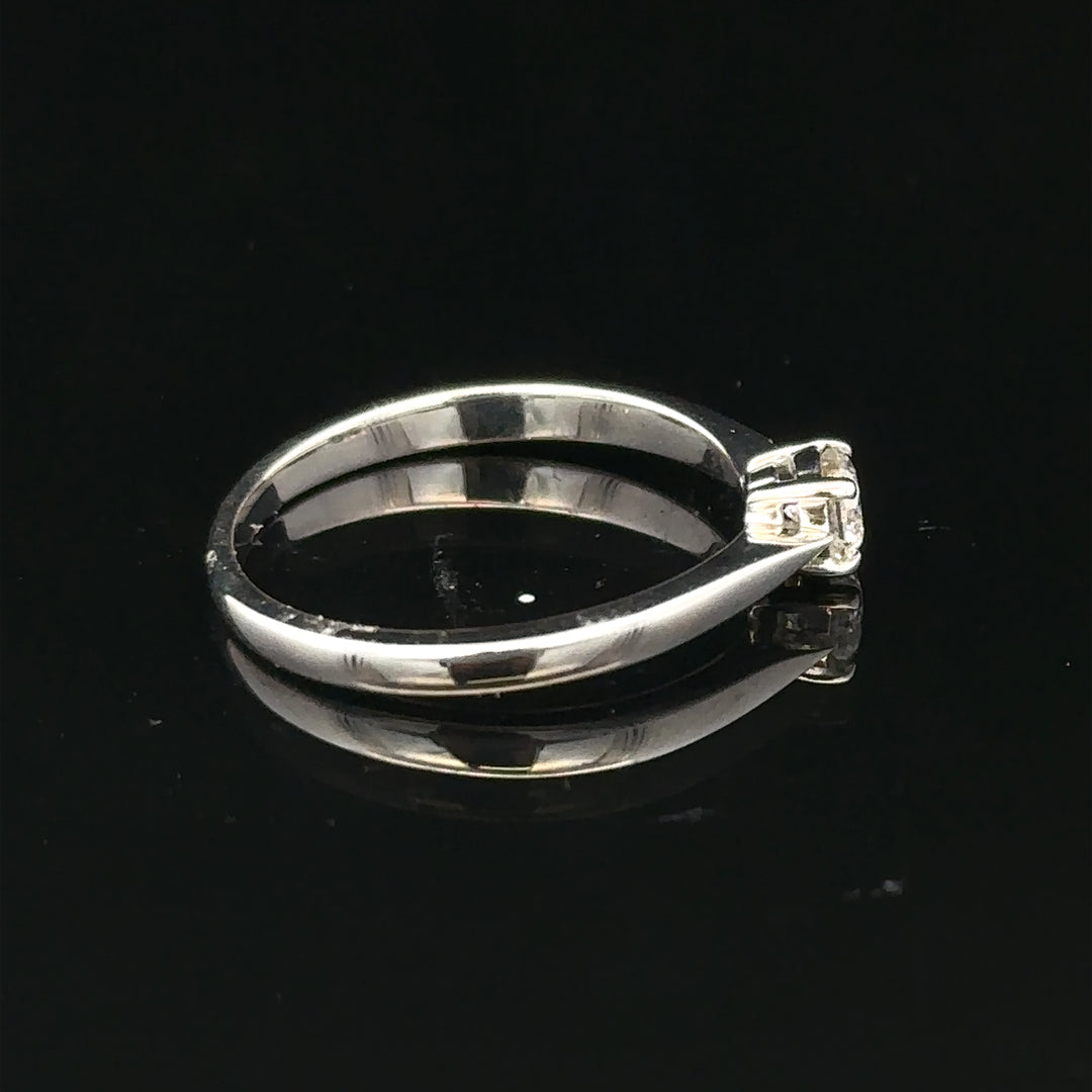 18ct white gold diamond ring, size M, featuring sparkling diamonds and a sleek band design.