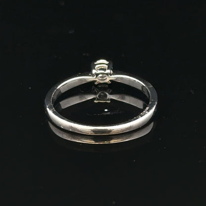 18ct white gold diamond ring in size M, featuring sparkling diamonds and a sleek band design.