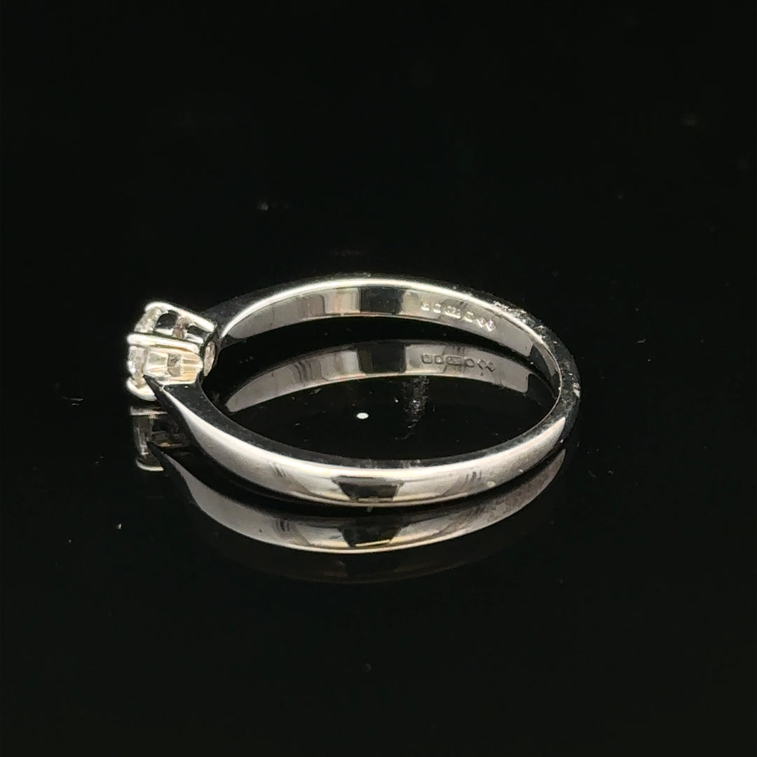 18ct white gold diamond ring in size M with sparkling diamonds, elegant jewelry piece with a sleek design.