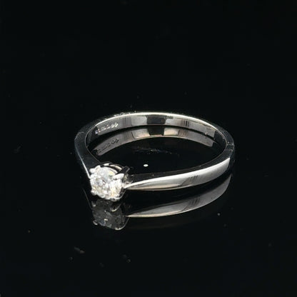 18ct white gold diamond ring in size M, featuring sparkling diamonds and a sleek band design.