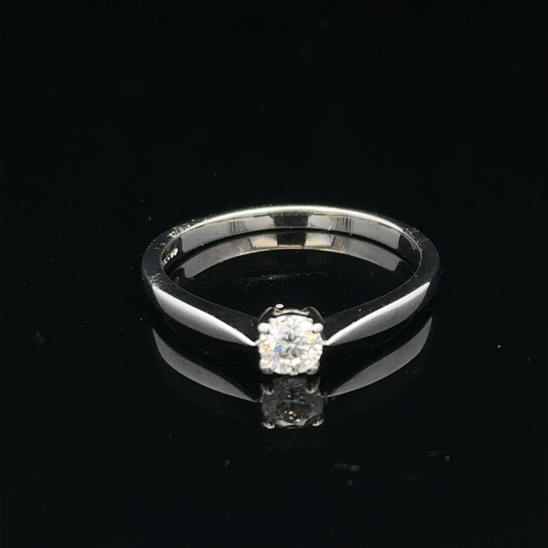 18ct white gold diamond ring in size M with sparkling diamonds, showcasing elegant jewelry design.