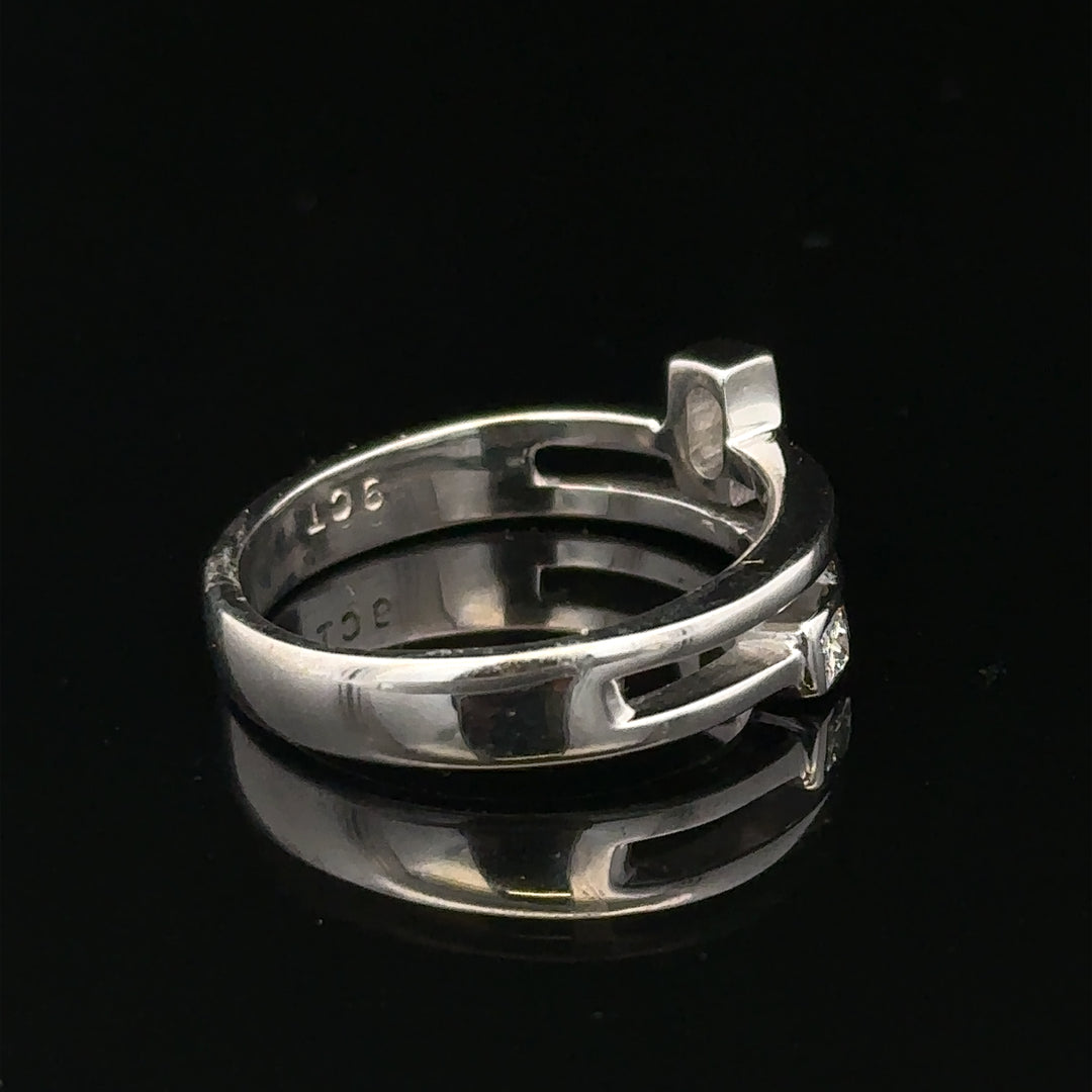 9ct white gold diamond ring size N with sparkling diamonds, unbranded jewelry piece on a plain background.