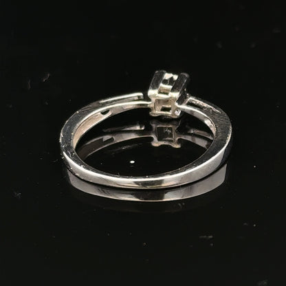 Elegant 9ct white gold diamond ring featuring sparkling diamonds set in a classic band design.