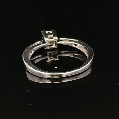 Elegant 9ct white gold diamond ring with sparkling diamonds set in a classic design.