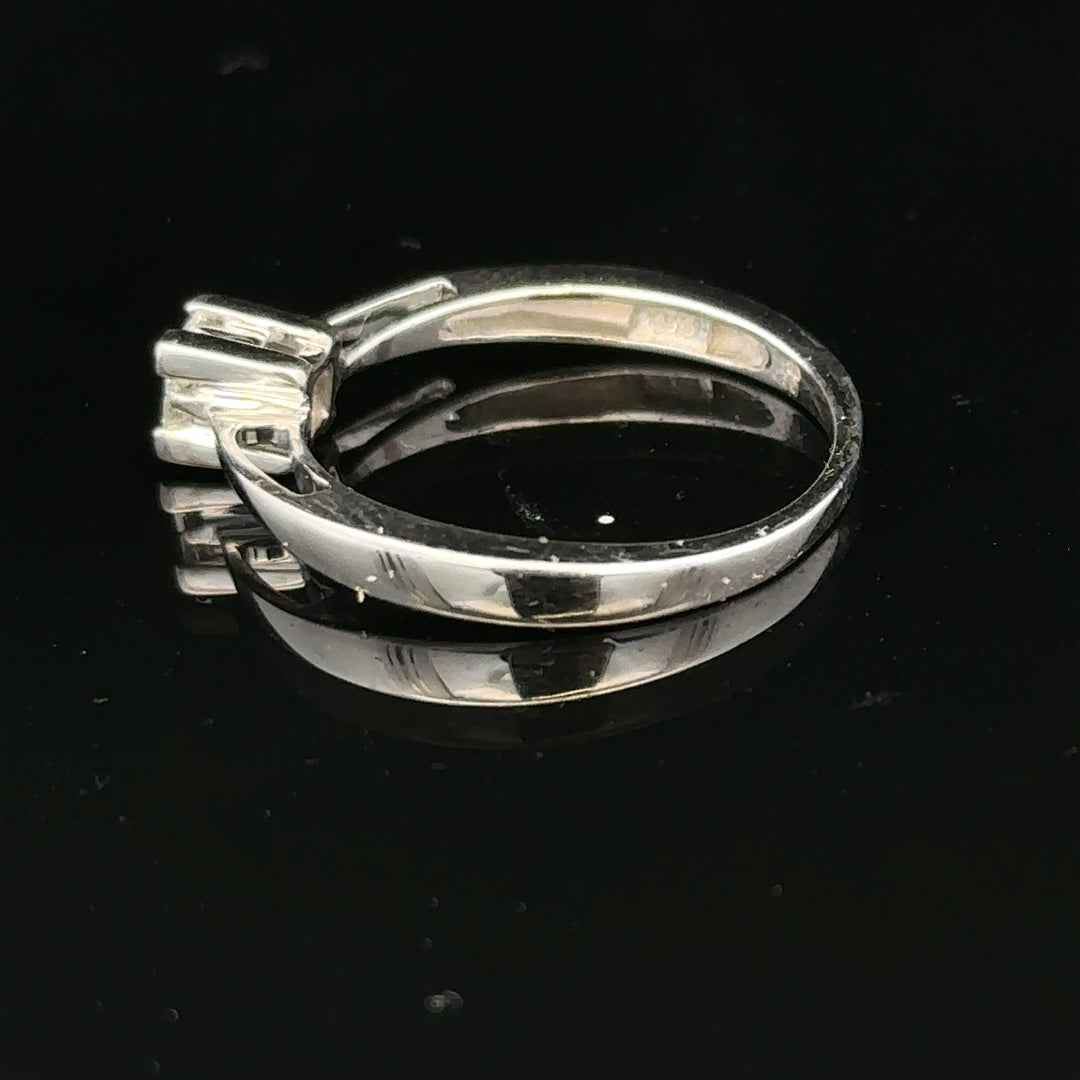 Elegant 9ct white gold diamond ring with sparkling diamonds, showcasing a classic design and fine craftsmanship.