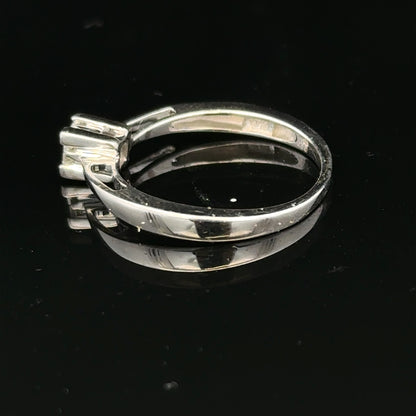 Elegant 9ct white gold diamond ring with sparkling diamonds, showcasing a classic design and fine craftsmanship.