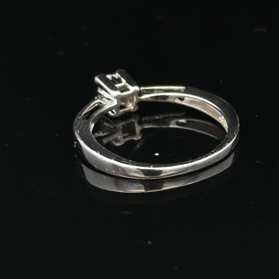 9ct white gold diamond ring with sparkling gemstones, elegant jewelry piece showcasing fine craftsmanship and radiant design.