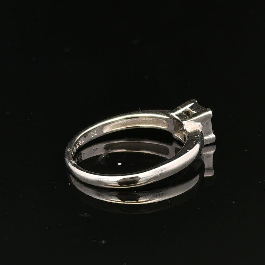 18ct white gold diamond ring with small sparkling diamonds, size J1/2, elegant and fine jewelry piece.