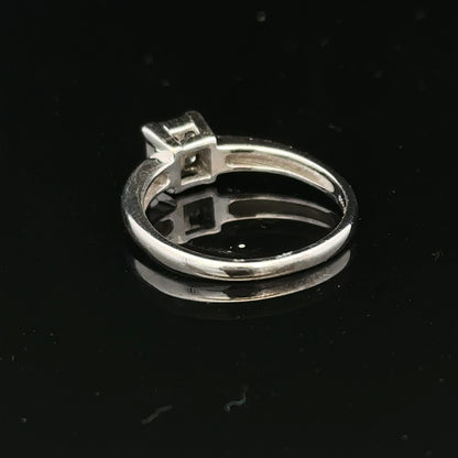 18ct white gold diamond ring with small sparkling diamonds, size J1/2, elegant jewelry piece with fine craftsmanship.