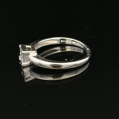 18ct white gold diamond ring with small sparkling diamonds, size J1/2, elegant jewelry piece.