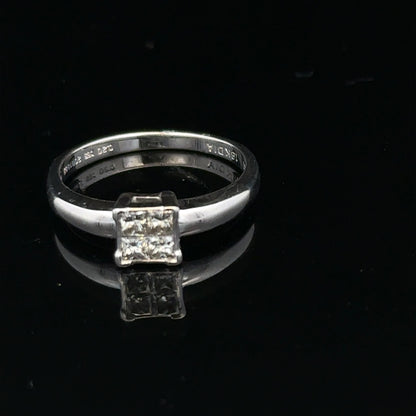 18ct white gold diamond ring with a solitaire setting, size J1/2, elegant jewelry piece with sparkling diamonds.