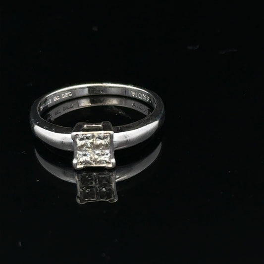 18ct white gold diamond ring with a solitaire setting, size J1/2, elegant jewelry piece with sparkling diamonds.